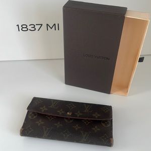 Louis Vuitton International wallet